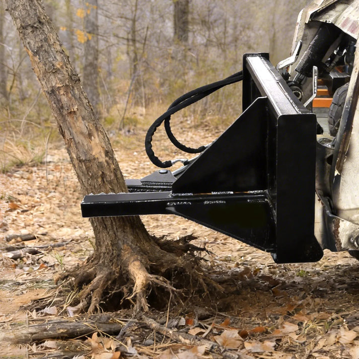 skid_steer_tree_puller_working view